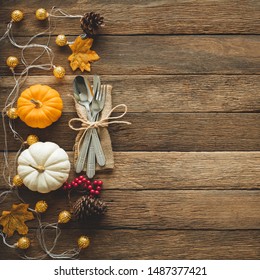 Thanksgiving Background, Pumpkin, Leaves And Decoration On Wood Table Background With Copy Space. Flatlay