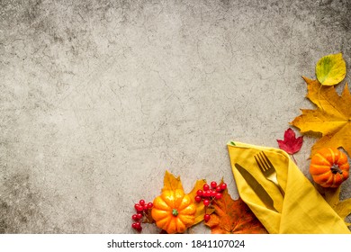 Thanksgiving Day Dinner Table With Autumn Vegetables And Cutlery, Top View