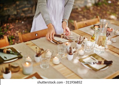 Thanksgiving Dinner Table Being Served For Guests By Waitress