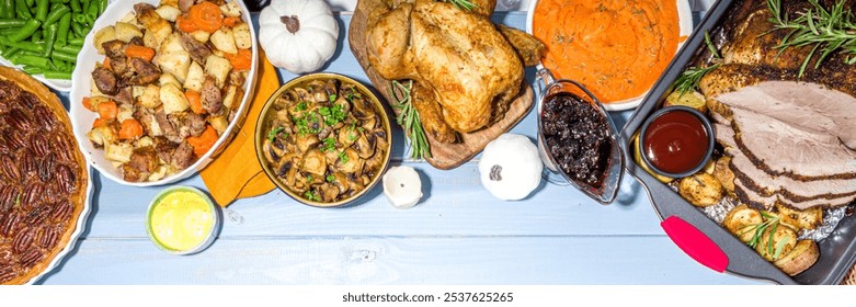 Thanksgiving dinner table with new traditional thanksgiving food - chicken, mashed sweet potatoes, green beans, pecan pie, baked ham pork, mac and cheese, stuffing, modern hard sunny light flatlay - Powered by Shutterstock