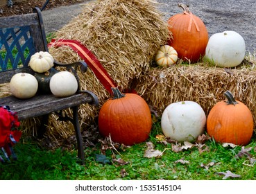 Thanksgiving Fall Harvest Outdoor Decorating Straw Hay Bales Pumpkins Acorns Gourds Mums Leaves Sunflowers Antique Window Pine Cones Needles Steel Milk Vase Window Box Bench Blanket Ribbon Beautiful