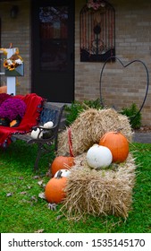 Thanksgiving Fall Harvest Outdoor Decorating Straw Hay Bales Pumpkins Acorns Gourds Mums Leaves Sunflowers Antique Window Pine Cones Needles Steel Milk Vase Window Box Bench Blanket Ribbon Beautiful