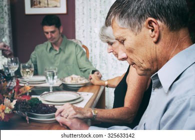 Thanksgiving: Family Says Prayer Before Dinner