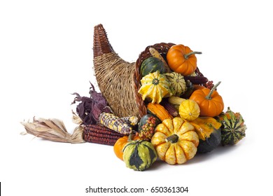 Thanksgiving festive cornucopia horn of plenty filled with autumn fruits and vegetables; isolated on white background  - Shutterstock ID 650361304