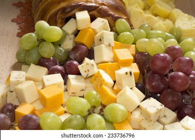 Thanksgiving Fruits and Cheeses Cornucopia  Bread on Wooden Board - Powered by Shutterstock