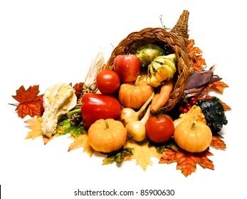 Thanksgiving Or Harvest Cornucopia Over A White Background