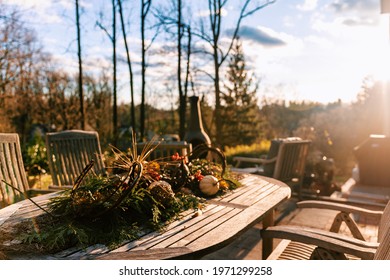 Thanksgiving Holiday Floral Wreath On The Table Outside In The Autumn 