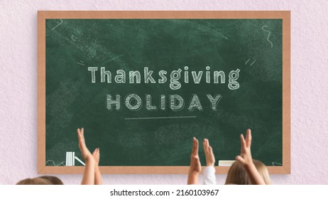 Thanksgiving Holiday Writing On Green Chalkboard, School Holidays Days, Students Raising Hands In Front Of The Chalk Board With Wooden Frame, School And Classroom Concept, Preparation For Thanksgiving