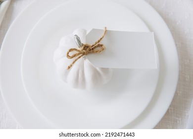 Thanksgiving Table Setting Mockup, Blank Card Tied To Pumpkin On Plate. Autumn Concept.