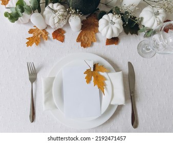 Thanksgiving Table Setting, Tableware And Decorations. Blank White Postcard On Table Mockup, Top View