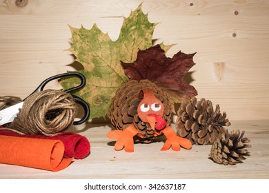 Thanksgiving Turkey Made Of Pine Cone And Autumn Leaves. Holiday Crafts Decoration