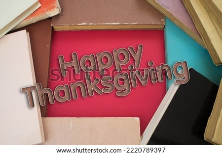 Thanksgiving word in opened book with vintage, natural patterns old antique paper design.