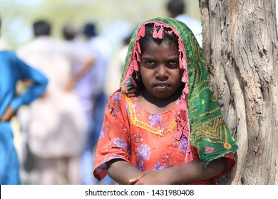 Tharparkar Sindh, Pakistan - March, 2019: Poor Village Girl Boys Children Smiling Shying Face Closeup In Traditional Dress Thar Desert And Rajhastan India, Hinduism In Pakistan Hindu Religion People