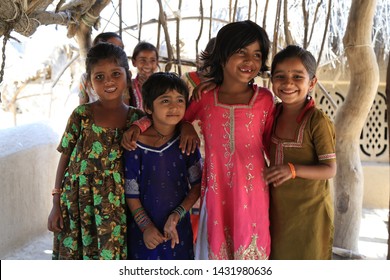 Tharparkar Sindh, Pakistan - March, 2019: Poor Village Girl Boys Children Smiling Shying Face Closeup In Traditional Dress Thar Desert And Rajhastan India, Hinduism In Pakistan Hindu Religion People