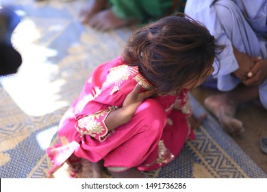 Tharparkar Sindh, Pakistan - March, 2019: Poor Village Girl Boys Woman Children Smiling Shying Face Closeup In Traditional Dress Thar Desert And Rajhastan India, Hinduism In Pakistan Hindu People