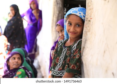 Tharparkar Sindh, Pakistan - March, 2019: Poor Village Girl Boys Woman Children Smiling Shying Face Closeup In Traditional Dress Thar Desert And Rajhastan India, Hinduism In Pakistan Hindu People