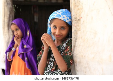 Tharparkar Sindh, Pakistan - March, 2019: Poor Village Girl Boys Woman Children Smiling Shying Face Closeup In Traditional Dress Thar Desert And Rajhastan India, Hinduism In Pakistan Hindu People