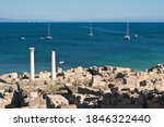 Tharros, Archeological area, Punic and Roman ruins and blue sea in Sardinia