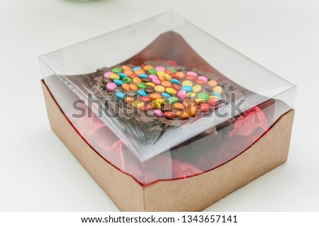 That beautiful box with a tasty chocolate egg stuffed with enough chocolate mass, candy, with spoon to give your loved ones