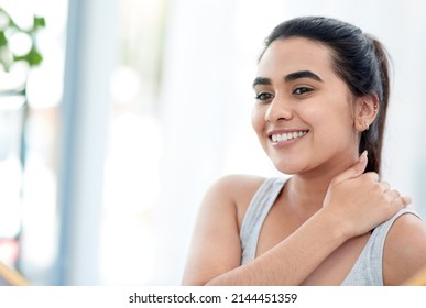 That Skincare Really Paid Off. Shot Of Young Woman Smiling Happily.