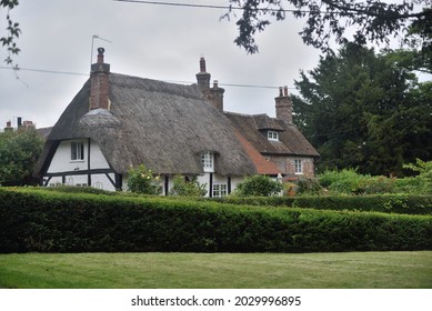 Thatched Cottage In A Dorset Village