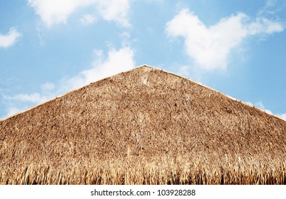 The Thatched Roof With Blue Sky