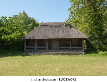 Thatched Roof Clubhouse On A Village Cricket Pitch In Rural Somerset, England, UK