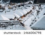 Thatched roof house,  village made of over 30 traditional Japanese houses  and snow covered street in Ouchi Juku village, Fukushima, Tohoku, Japan in Winter