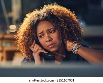 Thats Not What I Wanted To Hear. Shot Of A Young Businesswoman Making A Stressful Phone Call During A Late Night At Work.