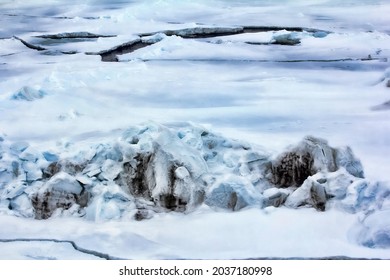 Thawed hummock of coastal ice. The North pole at latitude 98 degrees north