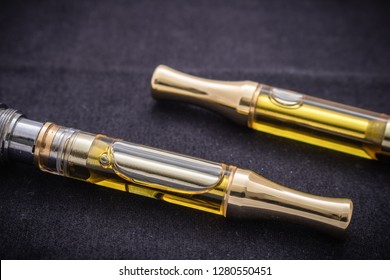 THC/CBD Cannabis Oil And Terpenes In Cartridge For Vaping The Alternative Medicine.   