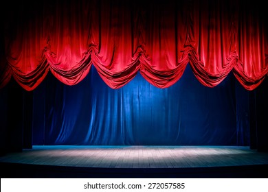 Theater Curtain And Stage With Dramatic Lighting