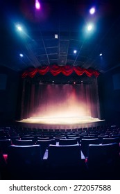 Theater Curtain And Stage With Dramatic Lighting