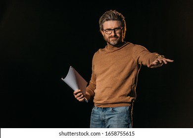 Theater Director Holding Scenario Isolated On Black