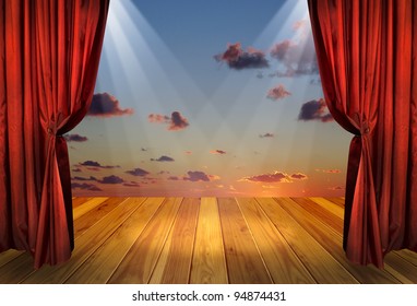 Theater Stage With Red Curtains And Spotlights On The Stage Wooden Floor. Theatre Interior With Decorations Of The Dramatic Sky Wallpaper.