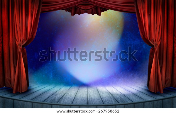 Theater stage with red curtains and spotlights.\
Theatrical scene in the light of searchlights, the interior of the\
old theater.