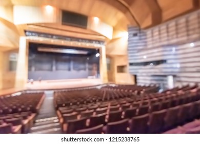 Theatre Play,  Opera Music Concert Hall, Performing Arts Entertainment Show Or Auditorium Blur Background With Blurry Stage For Drama Act Performance, And Empty Audience Seat In Large Room Interior