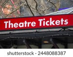 A Theatre Tickets sign in Leicester Square, London, UK.