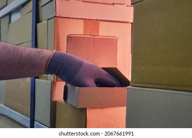 Theft From A Box In A Warehouse When Sending Goods By Mail, Hand In Glove