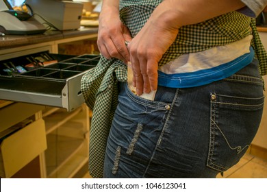 Theft at work - Shutterstock ID 1046123041