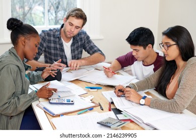 Their Finals Prep Is Going Well. Cropped Shot Of A Group Of University Students In A Study Group.