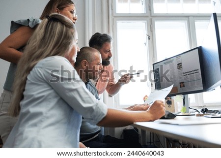 In their modest office, a group of independent journalists tirelessly work, driven by a shared passion for truth and storytelling. 