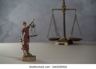 Themis. Law and Jusitce concept photo, silver stone background - Shutterstock ID 1663183426