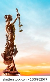 Themis Statue, Symbol Of Law And Justice With Sky Background