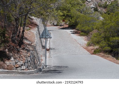 Thera Greece - 07 19 2022: Dry Lands On Santorini Greek Island In The Middle Of July