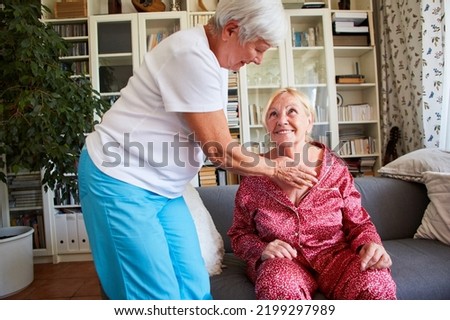 Therapist makes a trigger point massage on the sternum of a senior citizen with a ball