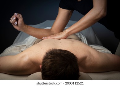 Therapist Performing Deep Tissue Massage Therapy