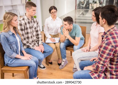 Therapist Speaking To A Rehab Group At Therapy Session.