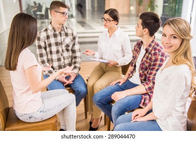 Therapist Speaking To A Rehab Group At Therapy Session.