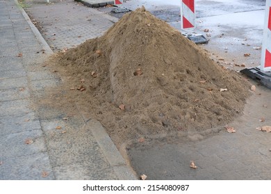 There Is A Big Pile Of Sand On The Construction Site